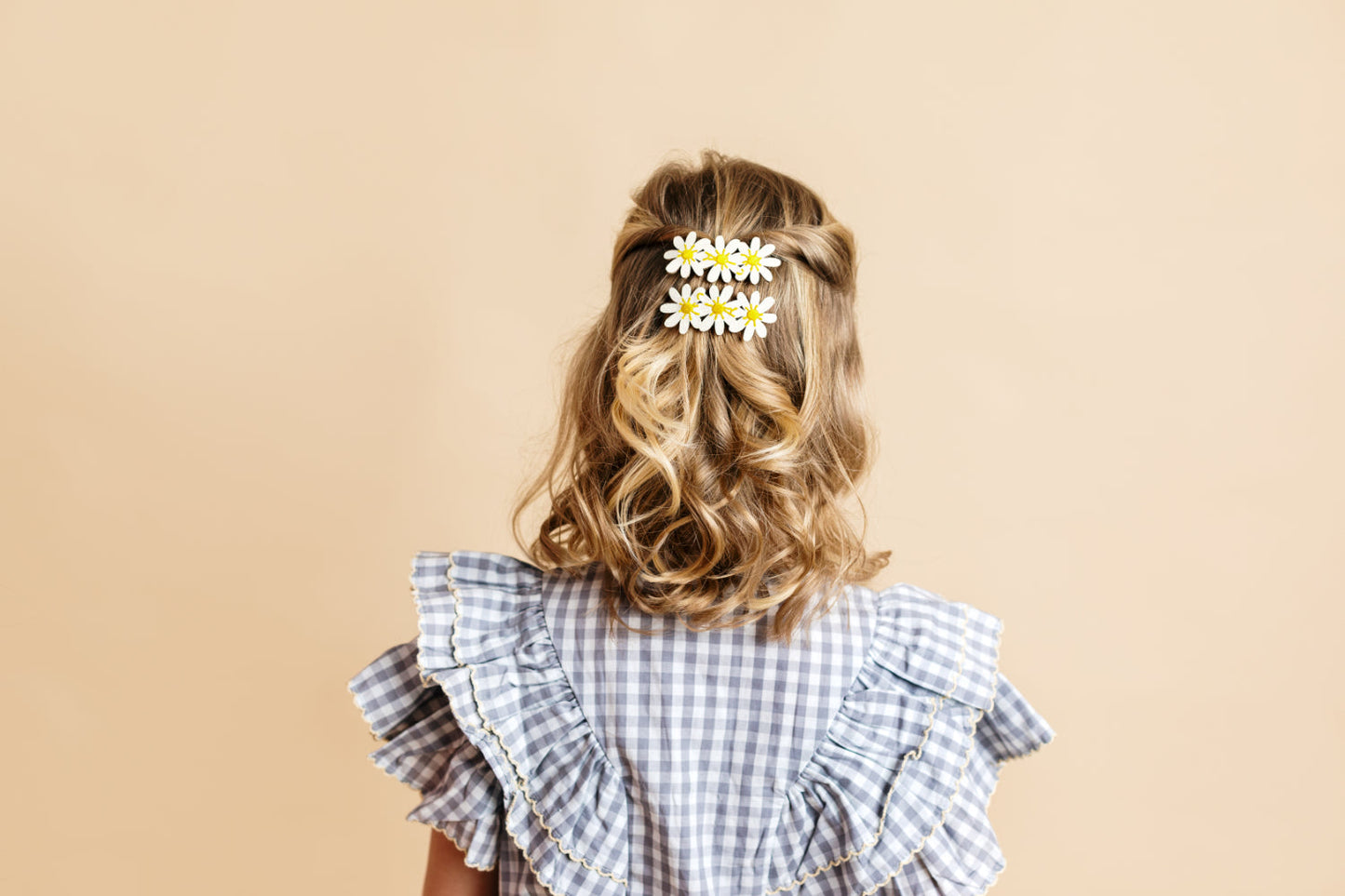 3 daisy barrette